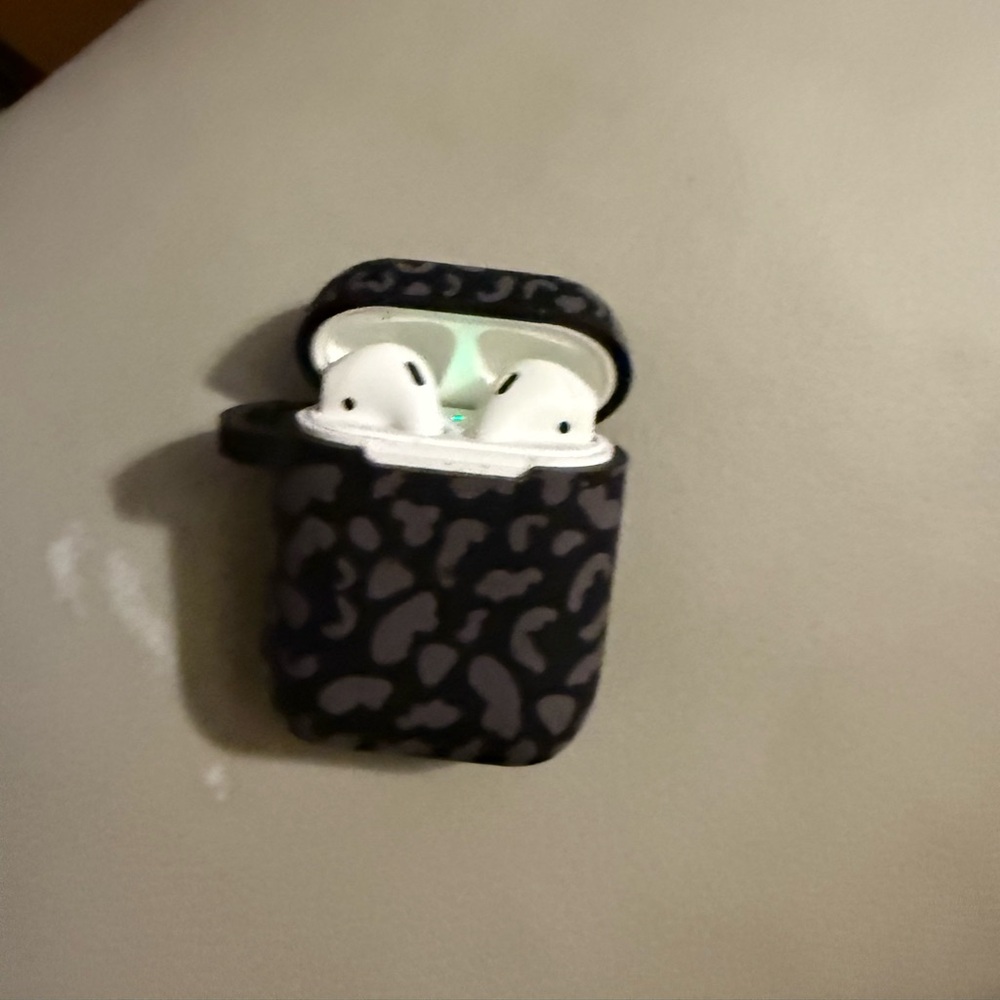 Apple AirPods Wireless Earbuds with Black Patterned Case. 1sr generation.